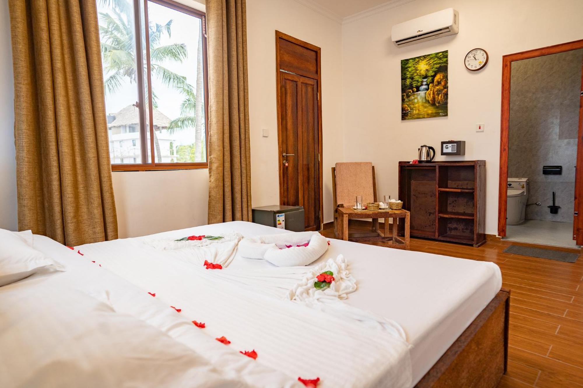 Aurora Beach Hotel Нунгви Экстерьер фото